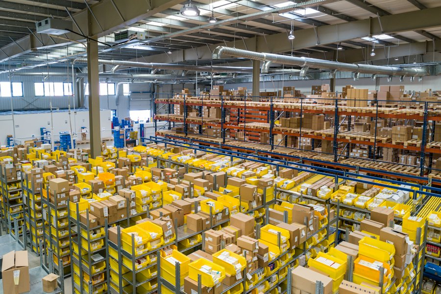 Warehouse with shelves and pallets